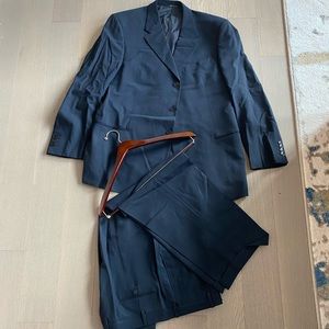 Men’s black Armani suit